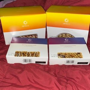 Lot of Optavia items.   2 boxes of bars and 2 boxes of Crunchy O's cereal.   New
